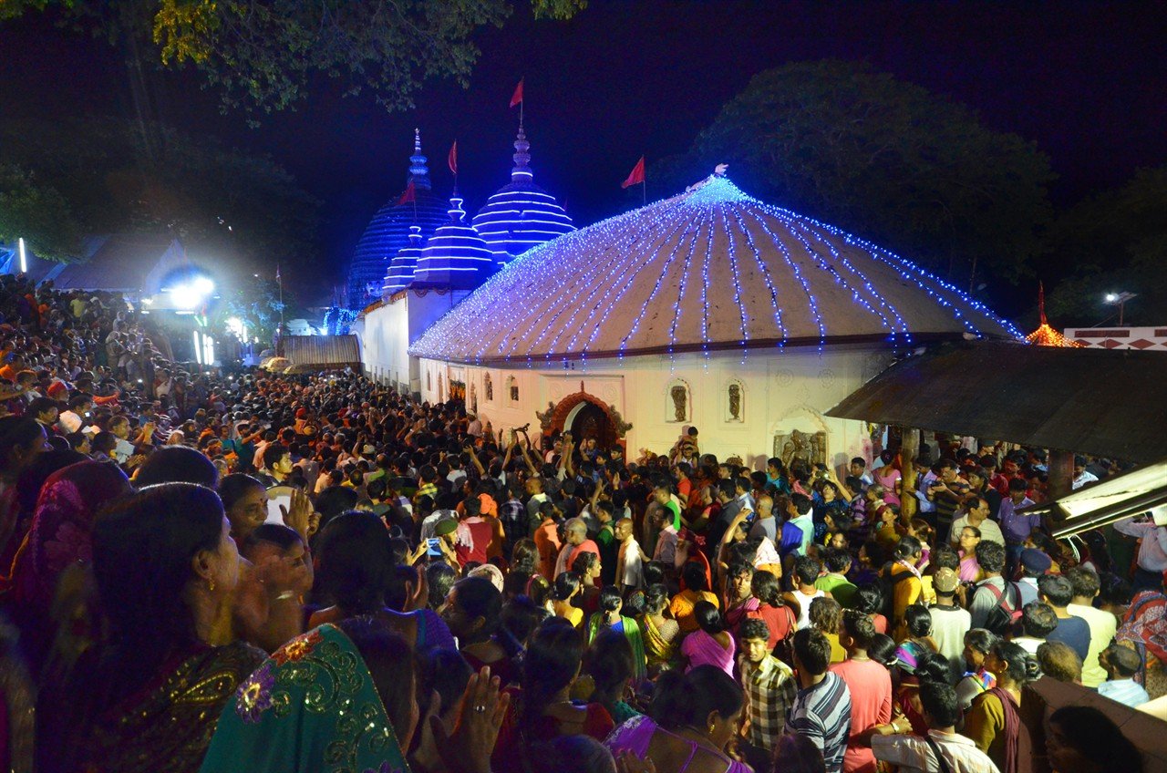 Night celebration of Ambubachi Mela at Kamakhya Temple with thousands of devotees
