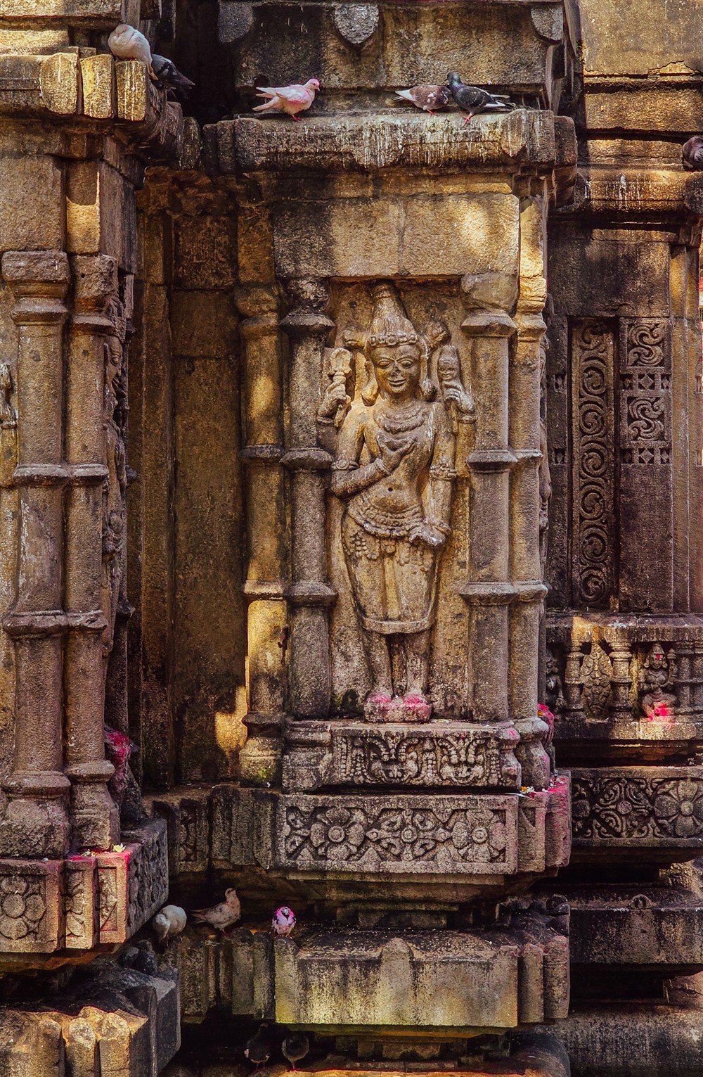 Centuries-old stone relief carvings on Kamakhya Temple outer sanctum wall